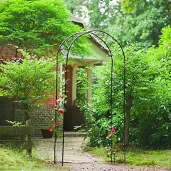 Pergola arche décor volutes en acier galvanisé